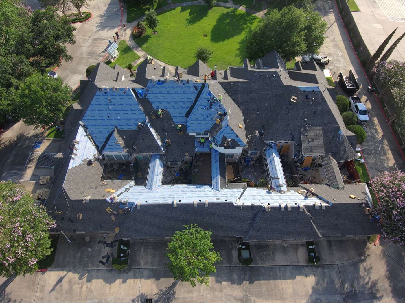 Aerial documentation photo of a large commercial roof replacement in progress